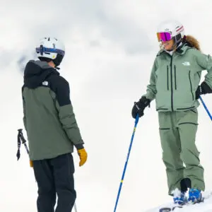 ski instructor giving feedback to skier