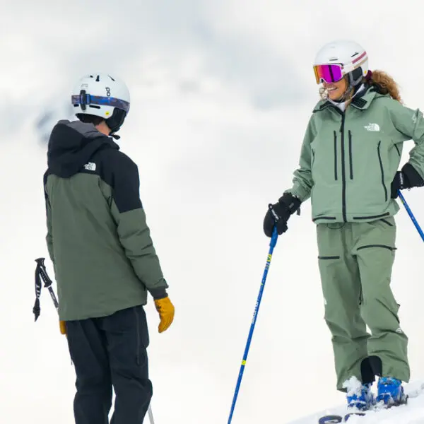 ski instructor giving feedback to skier