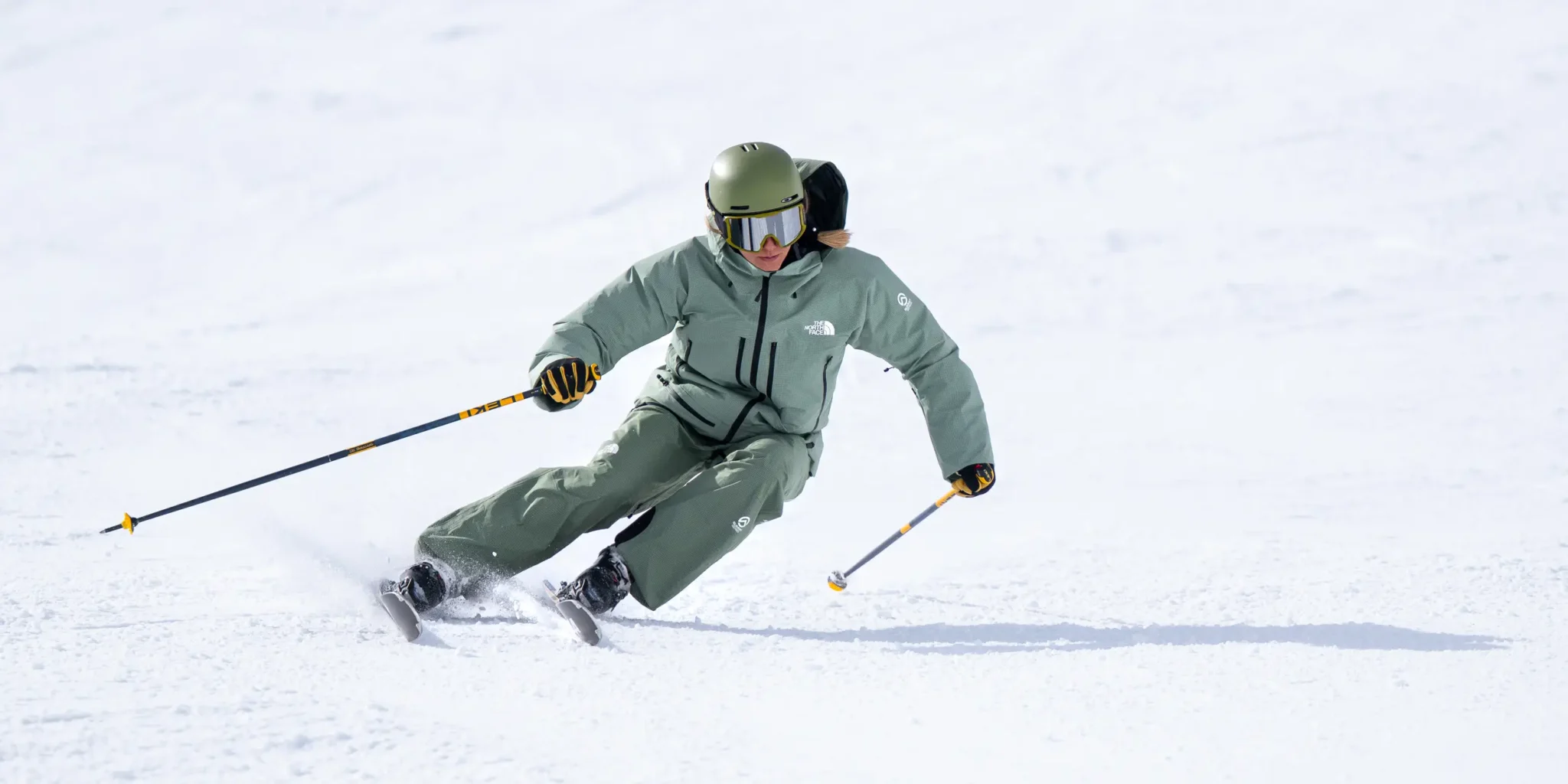 A student on verbier ski instructor course Skiing on snowy slope.