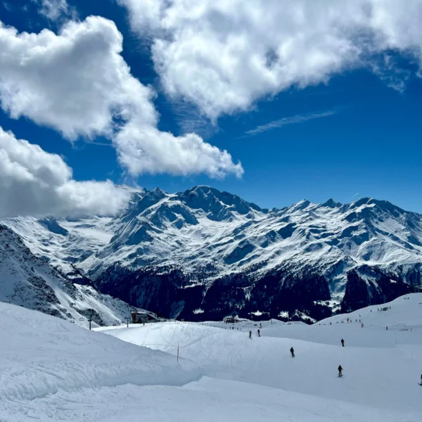 Snowy mountains under a blue sky