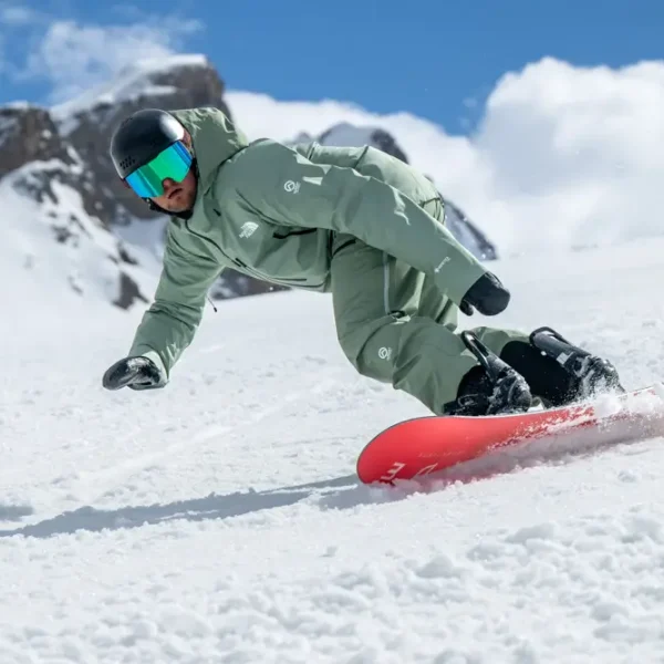 Snowboarder carving through fresh powder