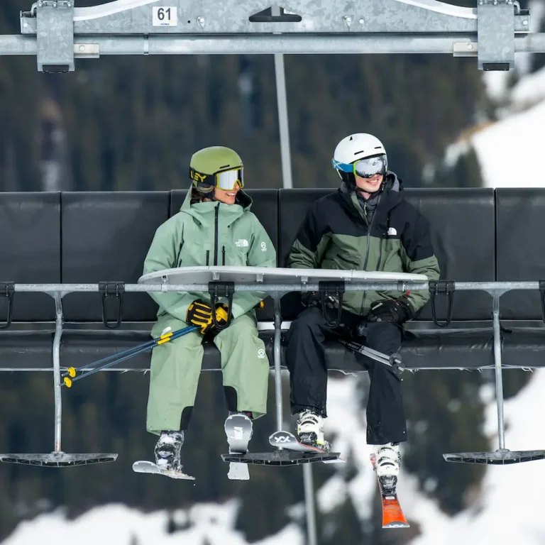 Intermediate skiers on a chair lift