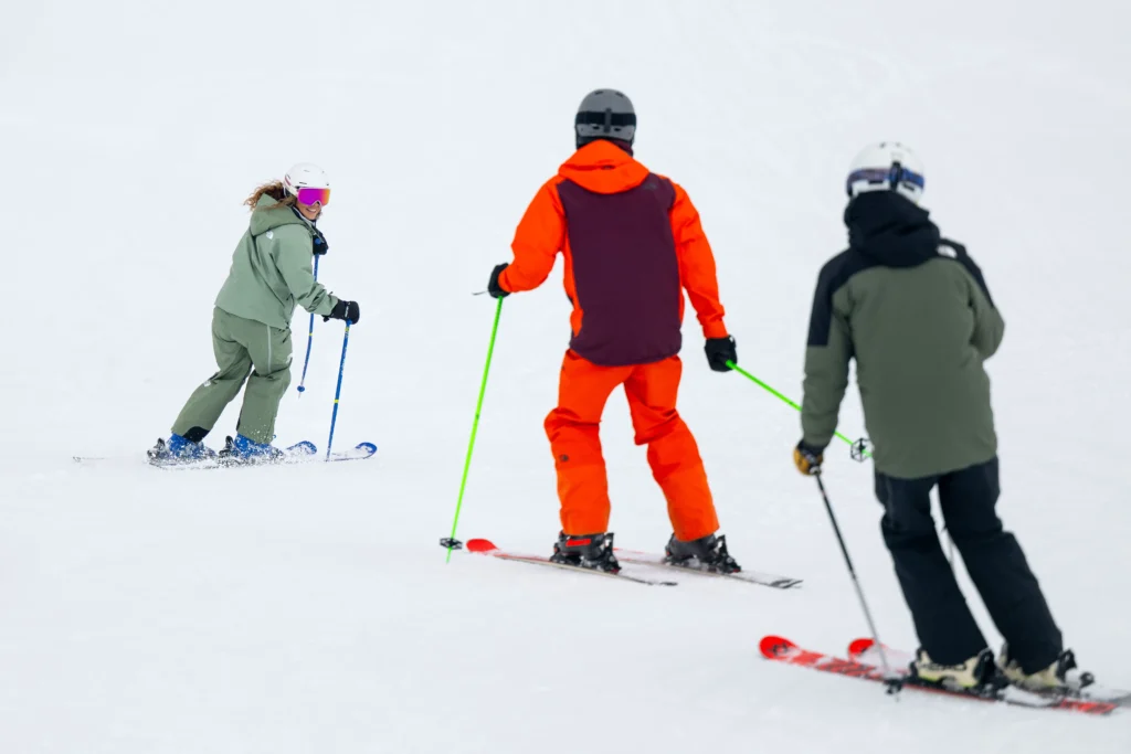 A New Generation Ski Instructor With Two Guests