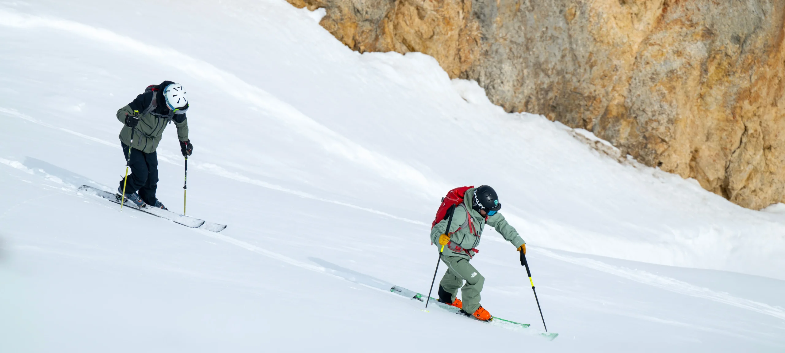A New Generation ski instructor touring with a guest off-piste
