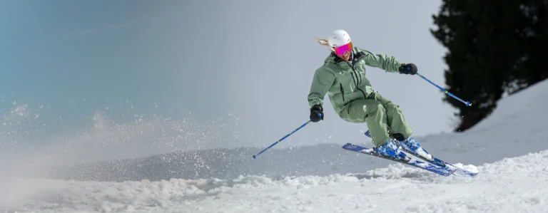 Skier navigating snowy slopes gracefully.