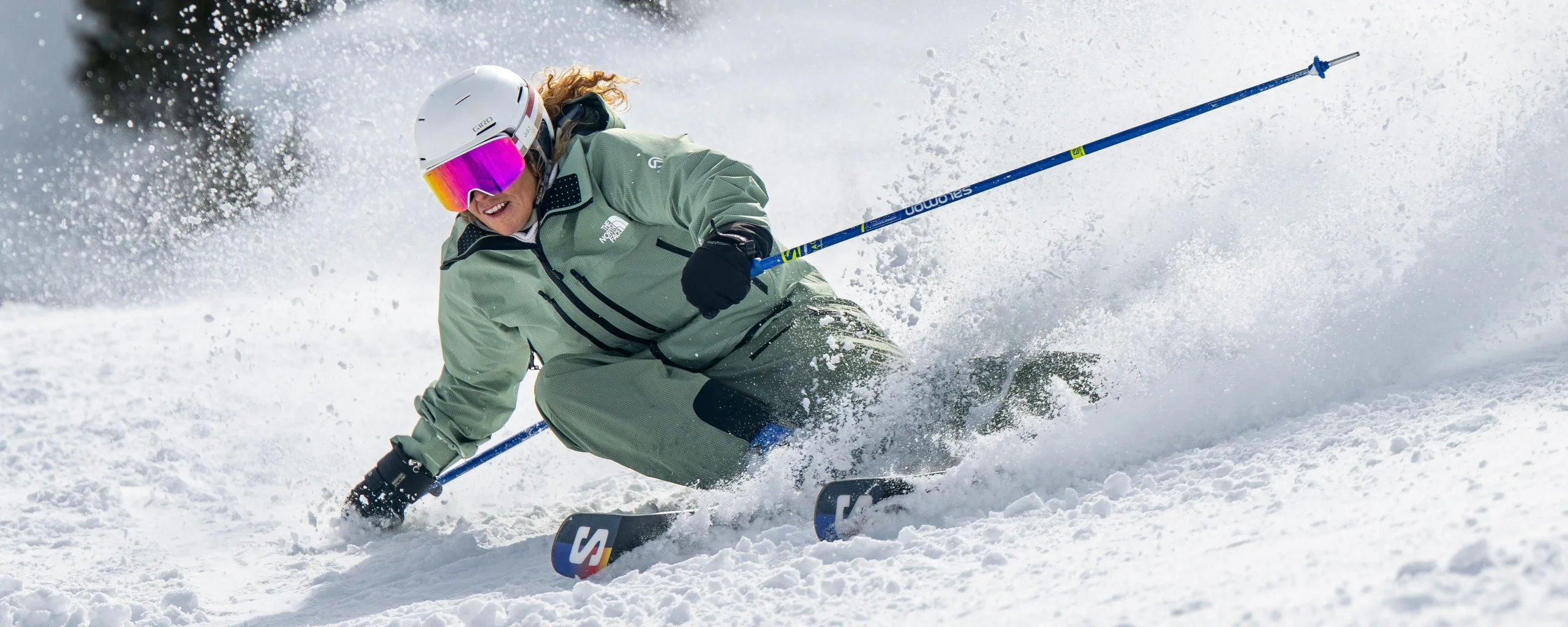 A New Generation ski instructor skiing longer turns on a slope that would be used for BASI Level 2 variables