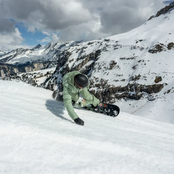 A snowboarder on on eof our intermediate Off Piste Snowboard Courses