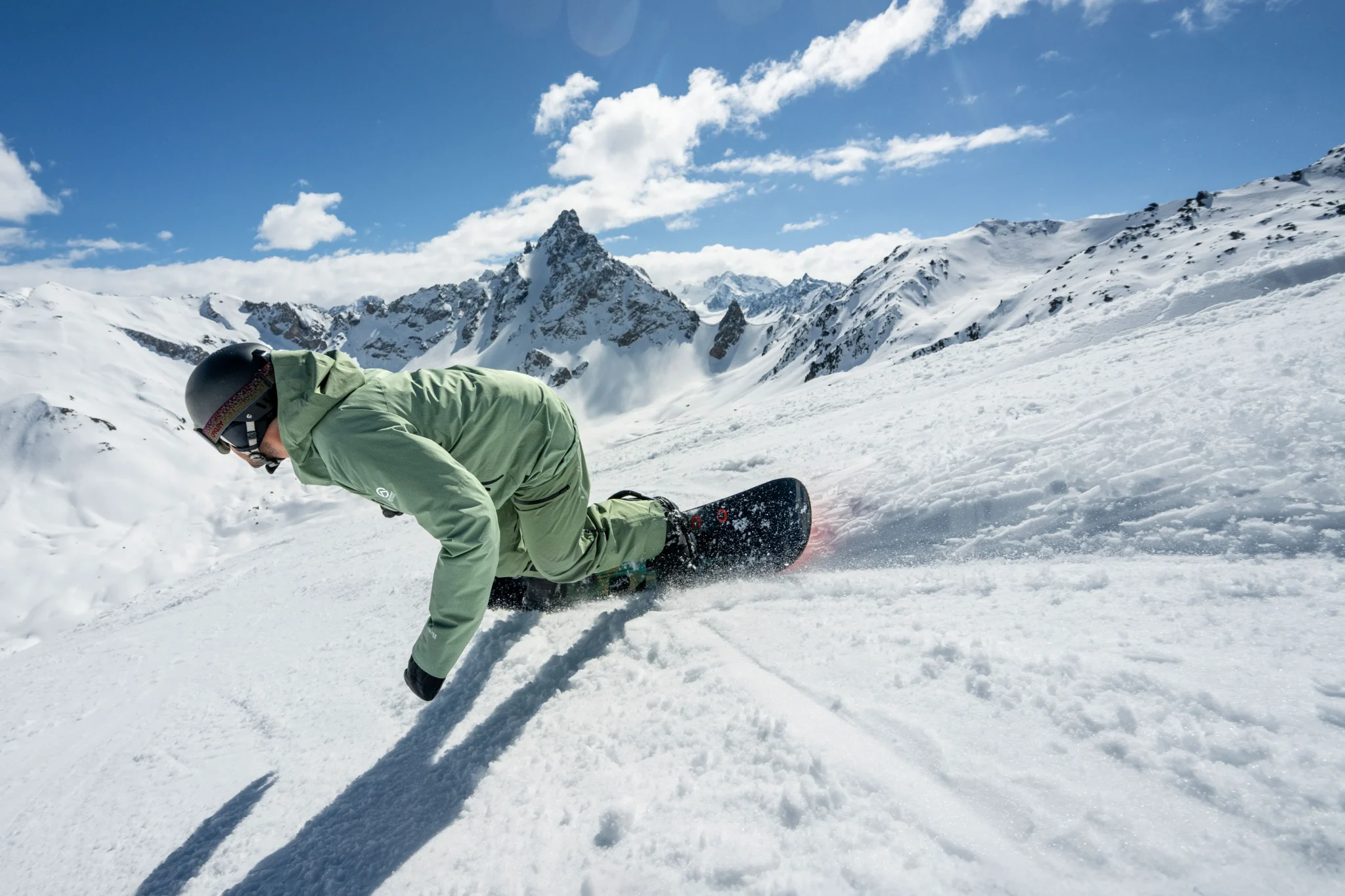 A snowboarder on one of our Intro To Off Piste Snowboard Courses