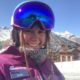 Girl with Zoe name tag and ski helmet on