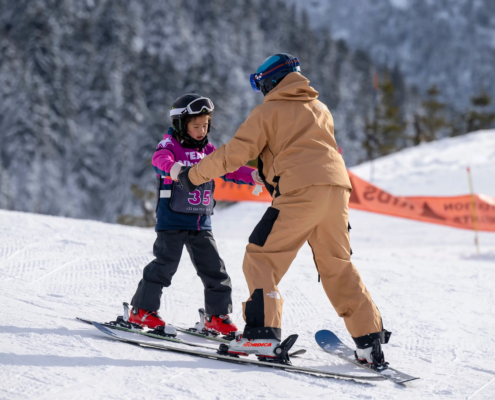 A child being guided by a Ski Instructor in Meribel