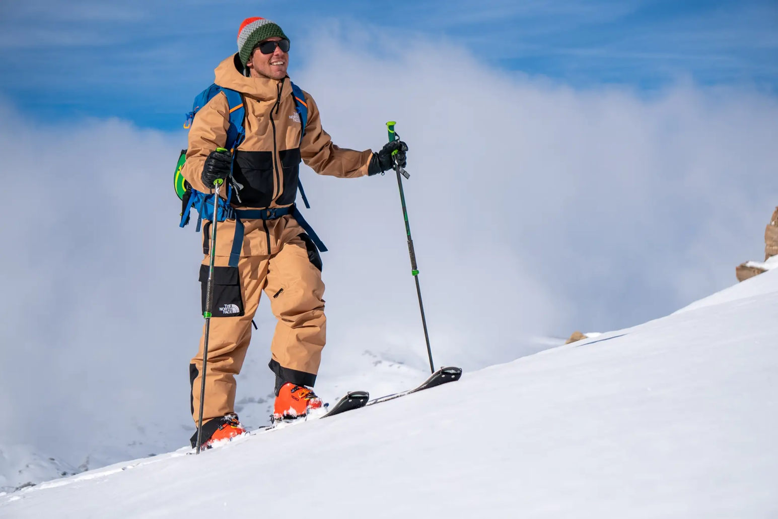 A ski instructor touring uphill
