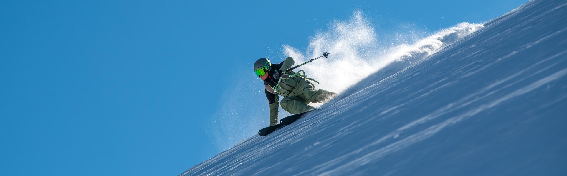 A Ski Instructor Skiing off-piste in his ski lesson